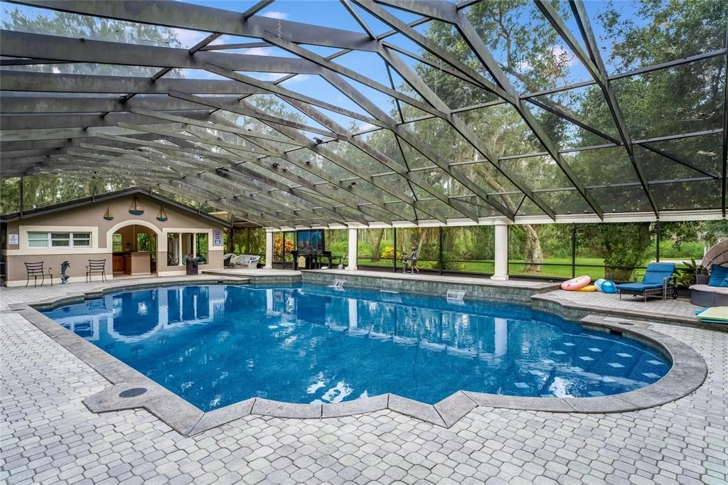 Escape to your own 54-acre playground! Fully furnished, income-generating Clermont Chain lakefront estate boasts 12 bedrooms, 3 kitchens, game rooms, arcade, pool and endless lake activities.