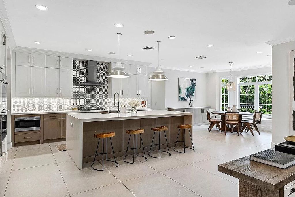 Immerse yourself in luxury at 1875 Lake Drive. This 7-bedroom entertainer's dream home blends indoor-outdoor living with a sparkling pool, gourmet kitchen, and spacious bedrooms, all in the desirable Lake Ida neighborhood just minutes from the beach and downtown Delray. Don't miss your chance to own a piece of paradise!