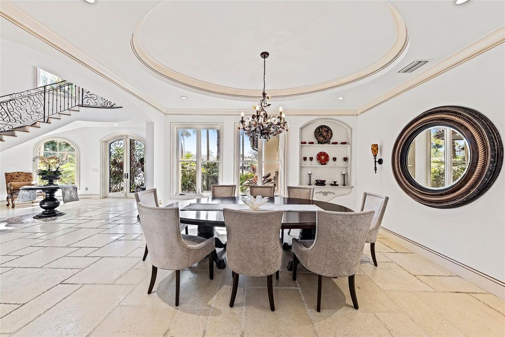 Immerse yourself in luxury living at this stunning Las Olas waterfront estate. Boasting 100' of deep water dockage, mega-yacht access, and panoramic water views, this 7-bedroom masterpiece is ideal for boaters and entertainers alike.