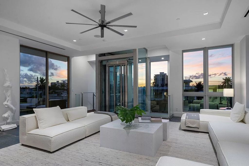 Experience Delray Beach's pinnacle of luxury living at CIELO. This architectural masterpiece boasts breathtaking ocean views, a custom glass elevator, and a rooftop oasis, all steps from the vibrant Atlantic Avenue.