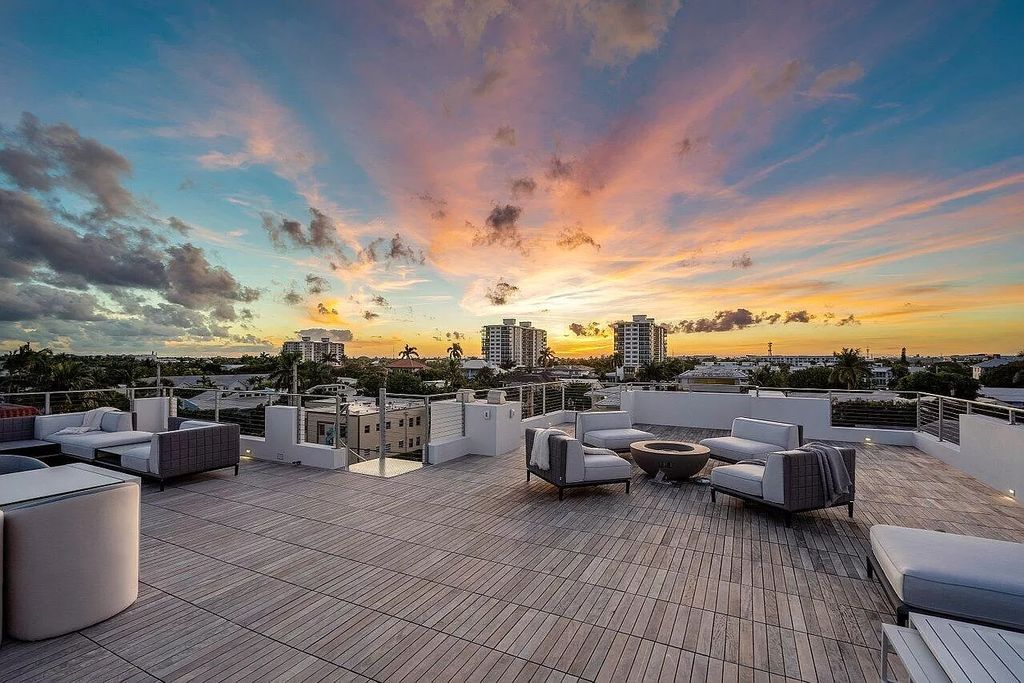 Experience Delray Beach's pinnacle of luxury living at CIELO. This architectural masterpiece boasts breathtaking ocean views, a custom glass elevator, and a rooftop oasis, all steps from the vibrant Atlantic Avenue.