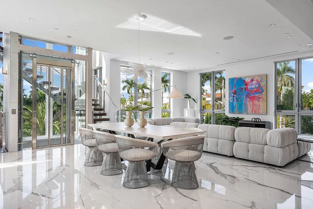 Experience Delray Beach's pinnacle of luxury living at CIELO. This architectural masterpiece boasts breathtaking ocean views, a custom glass elevator, and a rooftop oasis, all steps from the vibrant Atlantic Avenue.