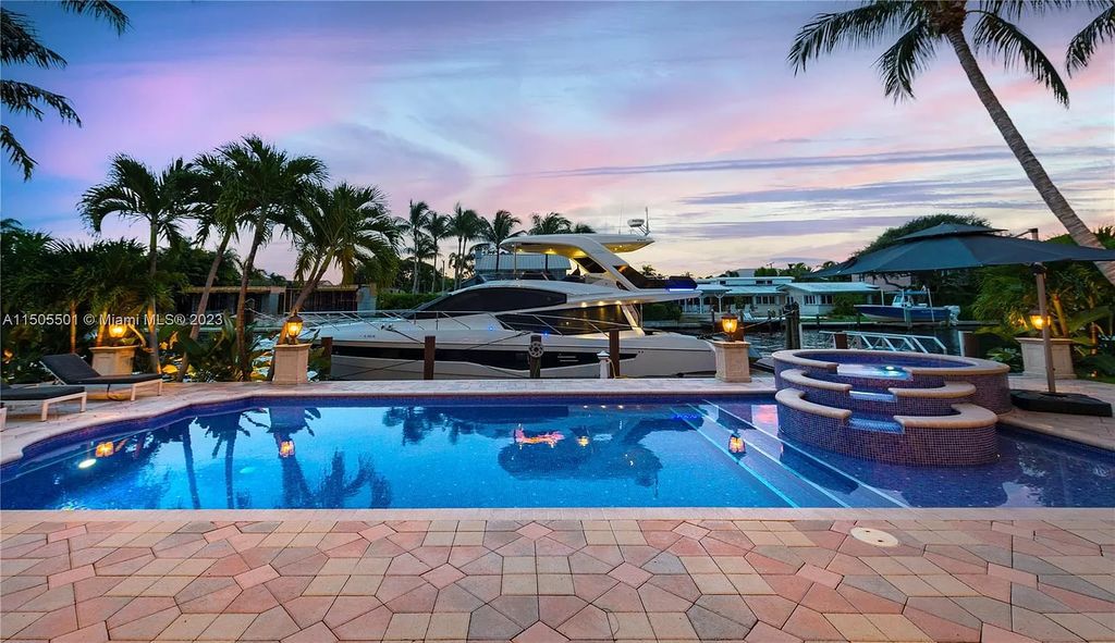 South Florida gem boasts resort-style pool, sun-drenched dock, A+ schools, vibrant walkability and morning sunrises/evening sunsets.