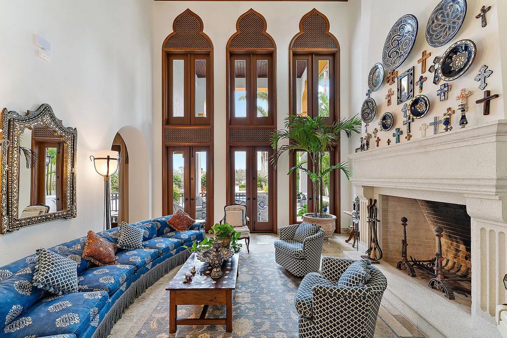 Experience ultimate waterfront living in this exquisite 5BR Palm Beach Gardens home. Exquisite Moroccan design, private dock, resort amenities and endless Intracoastal vistas. Don't miss out!