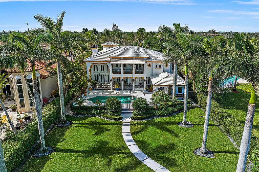 Experience ultimate waterfront living in this exquisite 5BR Palm Beach Gardens home. Exquisite Moroccan design, private dock, resort amenities and endless Intracoastal vistas. Don't miss out!