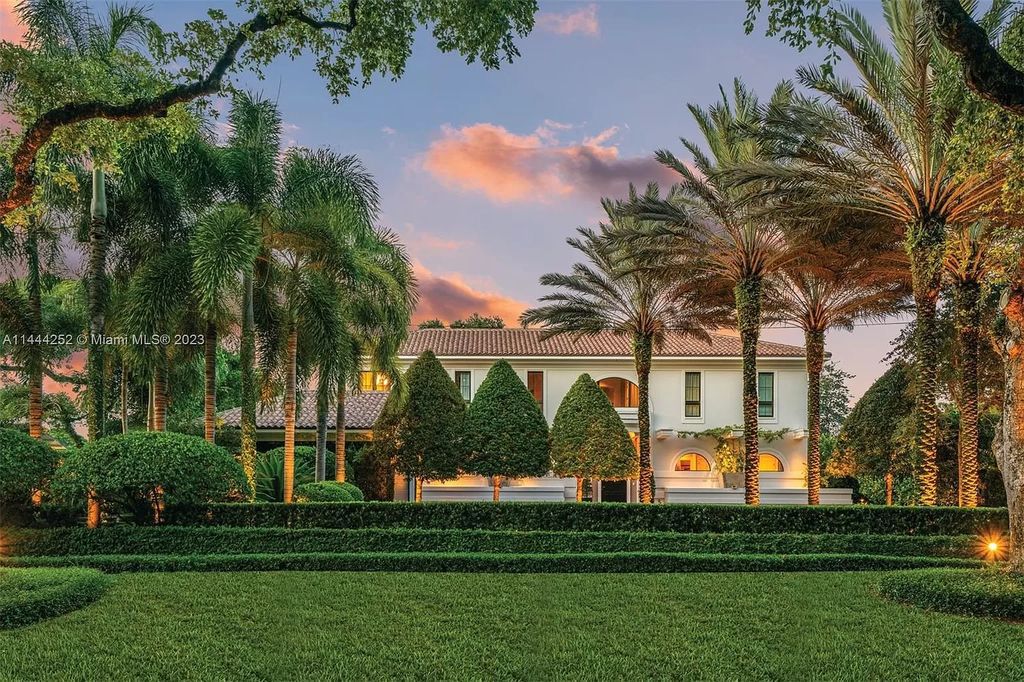 Experience unparalleled luxury in this meticulously designed 6-bedroom estate, boasting stunning golf course vistas, a chef's kitchen, resort-style pool, and prime location near Miami attractions.