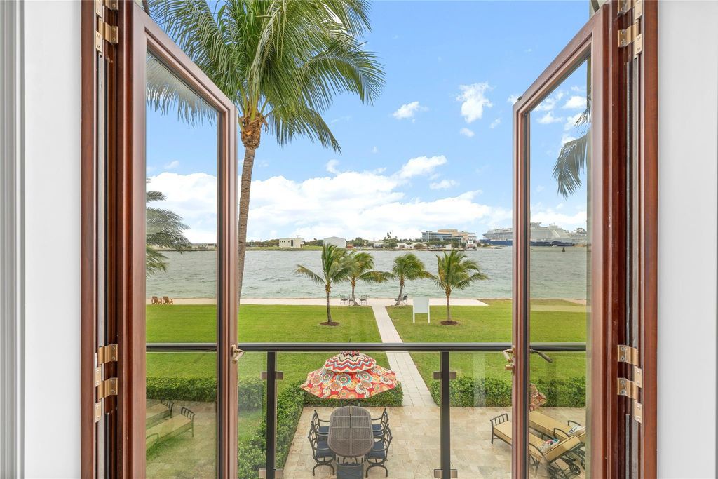 Wake up to mesmerizing ocean panoramas in this custom-built masterpiece. Graciously perched on the Port Everglades Ship Channel, this estate offers opulent living, endless entertainment, and the ultimate waterfront lifestyle.