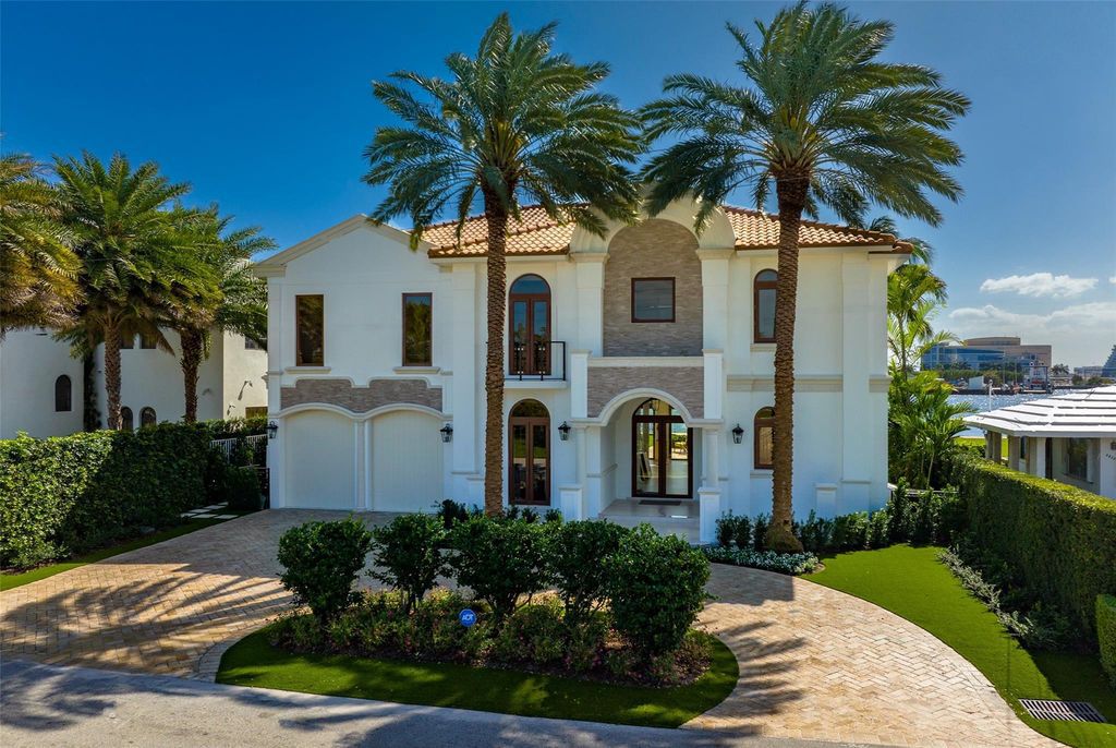 Wake up to mesmerizing ocean panoramas in this custom-built masterpiece. Graciously perched on the Port Everglades Ship Channel, this estate offers opulent living, endless entertainment, and the ultimate waterfront lifestyle.