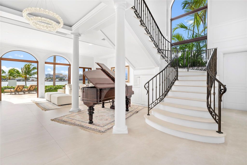 Wake up to mesmerizing ocean panoramas in this custom-built masterpiece. Graciously perched on the Port Everglades Ship Channel, this estate offers opulent living, endless entertainment, and the ultimate waterfront lifestyle.