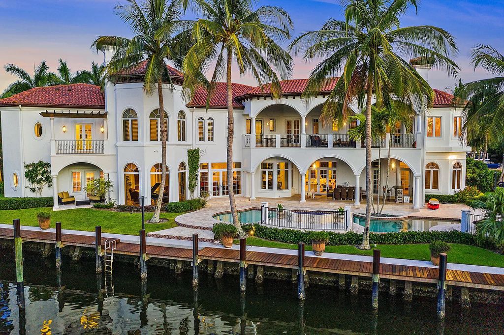 Experience the epitome of luxury waterfront living in this grand 5BR estate. Situated on an oversized lot in the prestigious Harbour Isles community, this home boasts over 10,000 sqft of living space, private preserve views, and a deep-water dock.