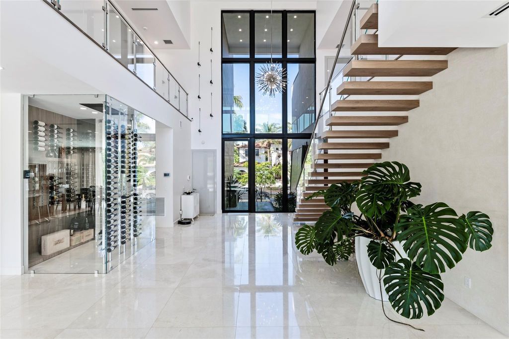 Unparalleled luxury awaits in this newer custom Las Olas Isles stunner. Exquisite contemporary architecture, 25ft ceilings and seamless indoor/outdoor living. Poggenpohl kitchen, wine cellar, media room/gym and 6 ensuite bedrooms. Resort-style pool, dock and city utilities. Jeff Hendricks masterpiece.