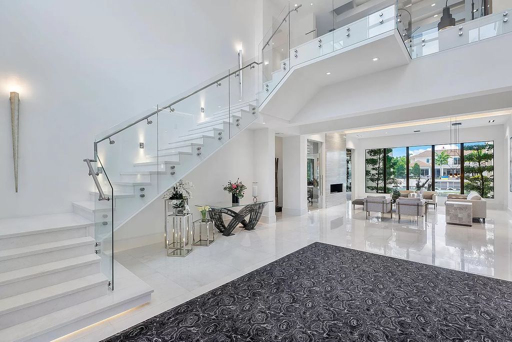 Unparalleled luxury awaits at 290 South Maya Palm Drive: 5 bedrooms, 6.2 baths, 9,000+ sqft of coastal-glam living with 140' waterfront, infinity pool and resort-style backyard. Agate walls, marble fireplaces and designer details. Boca Raton living redefined.