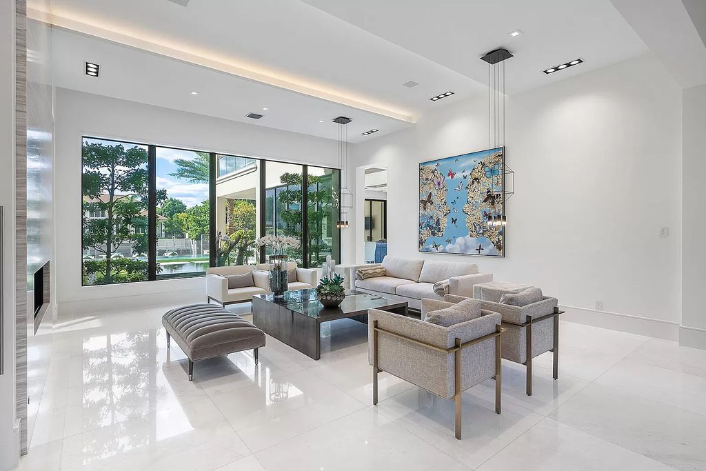 Unparalleled luxury awaits at 290 South Maya Palm Drive: 5 bedrooms, 6.2 baths, 9,000+ sqft of coastal-glam living with 140' waterfront, infinity pool and resort-style backyard. Agate walls, marble fireplaces and designer details. Boca Raton living redefined.