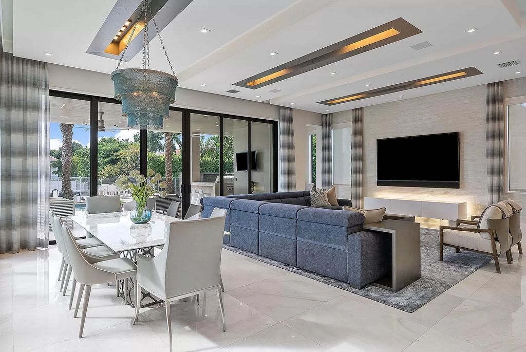 Unparalleled luxury awaits at 290 South Maya Palm Drive: 5 bedrooms, 6.2 baths, 9,000+ sqft of coastal-glam living with 140' waterfront, infinity pool and resort-style backyard. Agate walls, marble fireplaces and designer details. Boca Raton living redefined.