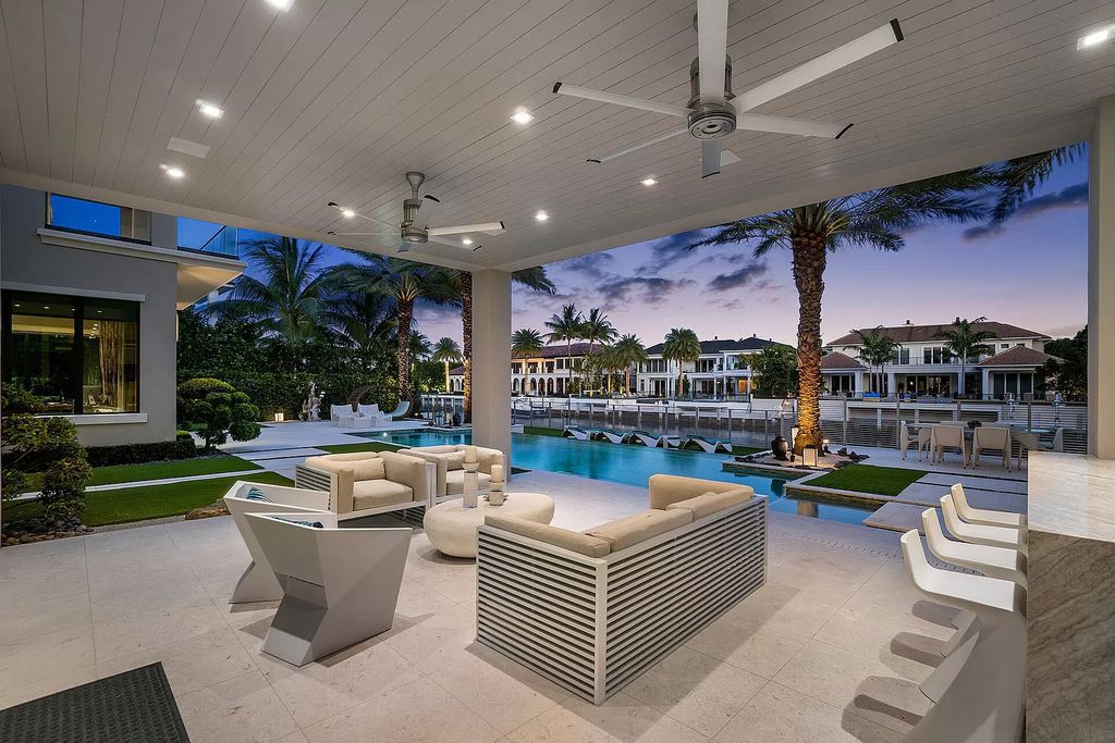 Unparalleled luxury awaits at 290 South Maya Palm Drive: 5 bedrooms, 6.2 baths, 9,000+ sqft of coastal-glam living with 140' waterfront, infinity pool and resort-style backyard. Agate walls, marble fireplaces and designer details. Boca Raton living redefined.