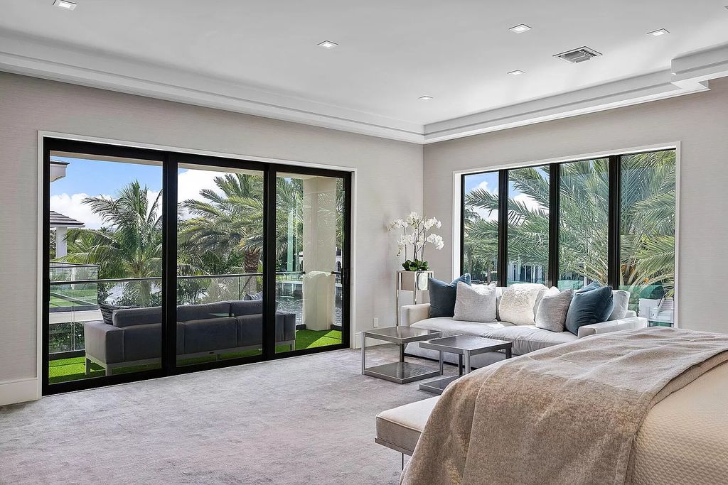 Unparalleled luxury awaits at 290 South Maya Palm Drive: 5 bedrooms, 6.2 baths, 9,000+ sqft of coastal-glam living with 140' waterfront, infinity pool and resort-style backyard. Agate walls, marble fireplaces and designer details. Boca Raton living redefined.