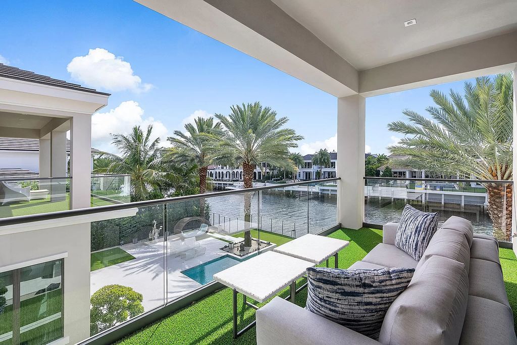 Unparalleled luxury awaits at 290 South Maya Palm Drive: 5 bedrooms, 6.2 baths, 9,000+ sqft of coastal-glam living with 140' waterfront, infinity pool and resort-style backyard. Agate walls, marble fireplaces and designer details. Boca Raton living redefined.