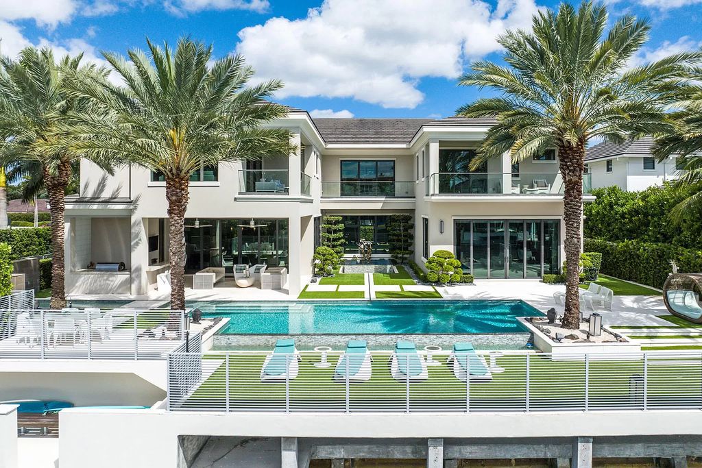 Unparalleled luxury awaits at 290 South Maya Palm Drive: 5 bedrooms, 6.2 baths, 9,000+ sqft of coastal-glam living with 140' waterfront, infinity pool and resort-style backyard. Agate walls, marble fireplaces and designer details. Boca Raton living redefined.