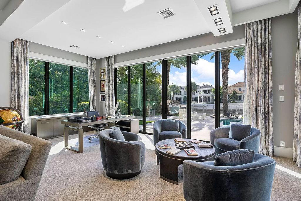 Unparalleled luxury awaits at 290 South Maya Palm Drive: 5 bedrooms, 6.2 baths, 9,000+ sqft of coastal-glam living with 140' waterfront, infinity pool and resort-style backyard. Agate walls, marble fireplaces and designer details. Boca Raton living redefined.