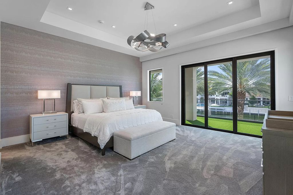 Unparalleled luxury awaits at 290 South Maya Palm Drive: 5 bedrooms, 6.2 baths, 9,000+ sqft of coastal-glam living with 140' waterfront, infinity pool and resort-style backyard. Agate walls, marble fireplaces and designer details. Boca Raton living redefined.