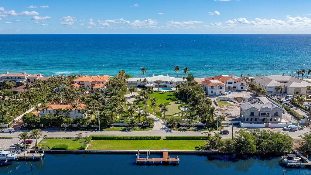 Exceptional estate with 200 feet ocean and 190 feet Intracoastal frontage! Updated, move-in ready with pools, deep water dock and endless possibilities. Steps to Delray and Palm Beach. Must-see waterfront!