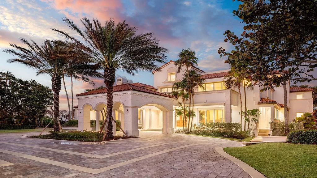 This opulent 8-bedroom estate boasts 150 feet of ocean and Intracoastal frontage, private beach house, resort-style pool, & stunning updates. Enjoy water views, private dock and manicured grounds in exclusive Manalapan.