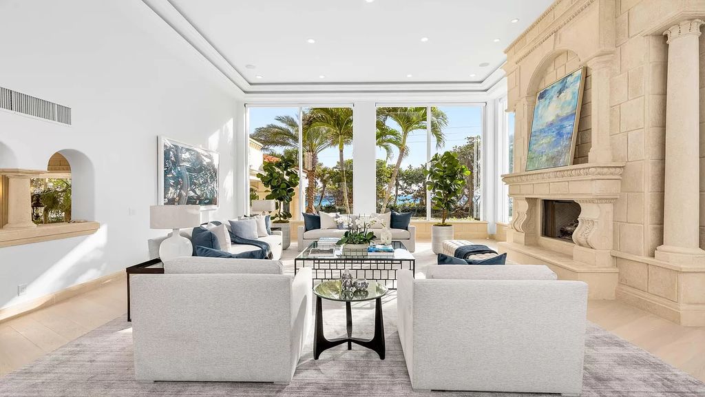 This opulent 8-bedroom estate boasts 150 feet of ocean and Intracoastal frontage, private beach house, resort-style pool, & stunning updates. Enjoy water views, private dock and manicured grounds in exclusive Manalapan.