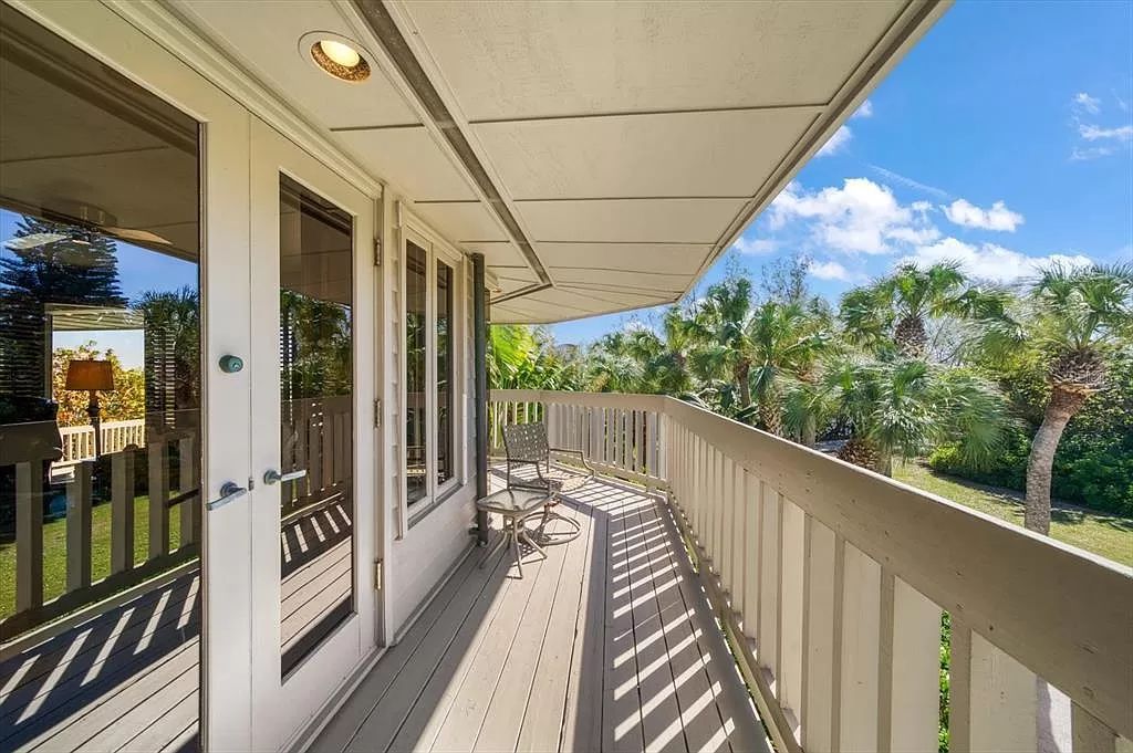 Find serenity on this pristine Florida estate. Enjoy miles of private beach, protected dockage, stunning views, and an elevated home with a unique indoor pool.