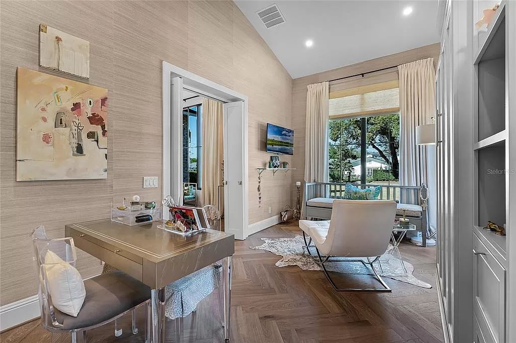 This stunning 2020 Alys-Rosemary Beach-style home boasts designer finishes, seamless indoor-outdoor flow, & a private pool oasis.