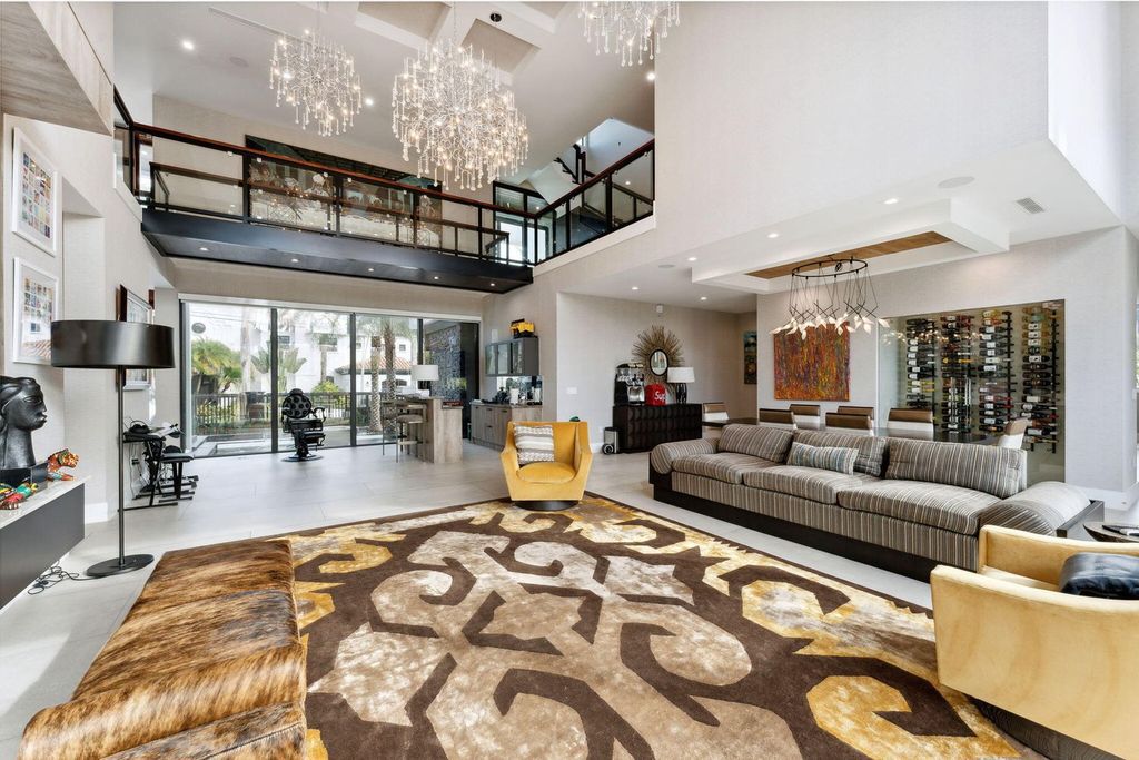 This stunning 3-story masterpiece boasts soaring ceilings, panoramic views and smart home tech.