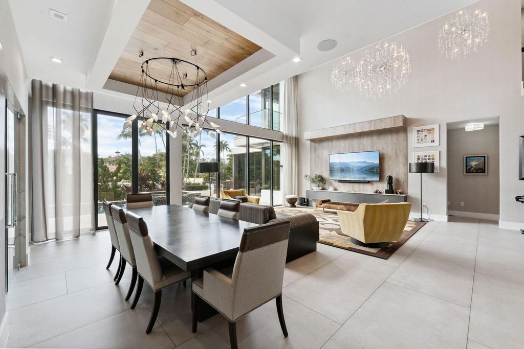 This stunning 3-story masterpiece boasts soaring ceilings, panoramic views and smart home tech.