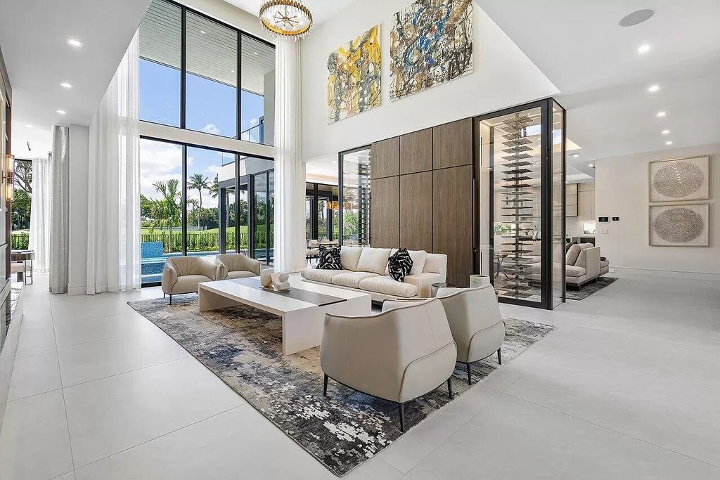 Featuring a gourmet kitchen, infinity pool, resort-style entertaining area, and stunning golf course views, this designer-furnished masterpiece offers unparalleled living.