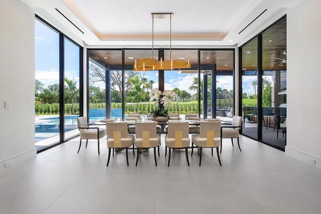 Featuring a gourmet kitchen, infinity pool, resort-style entertaining area, and stunning golf course views, this designer-furnished masterpiece offers unparalleled living.