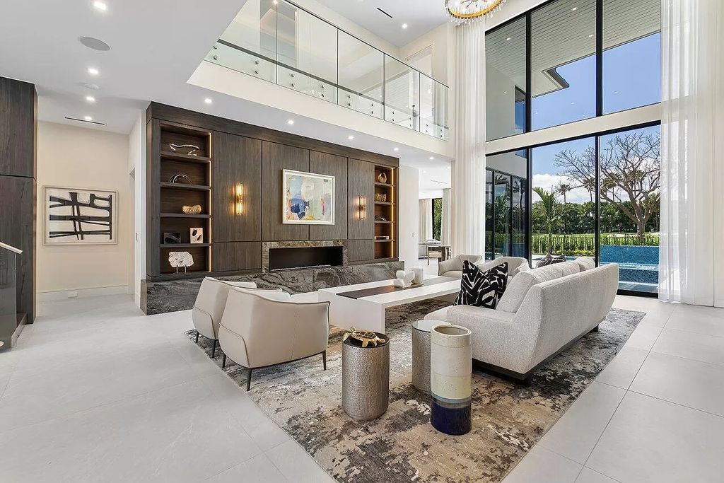 Featuring a gourmet kitchen, infinity pool, resort-style entertaining area, and stunning golf course views, this designer-furnished masterpiece offers unparalleled living.