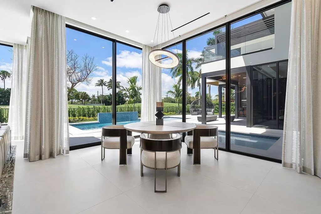 Featuring a gourmet kitchen, infinity pool, resort-style entertaining area, and stunning golf course views, this designer-furnished masterpiece offers unparalleled living.