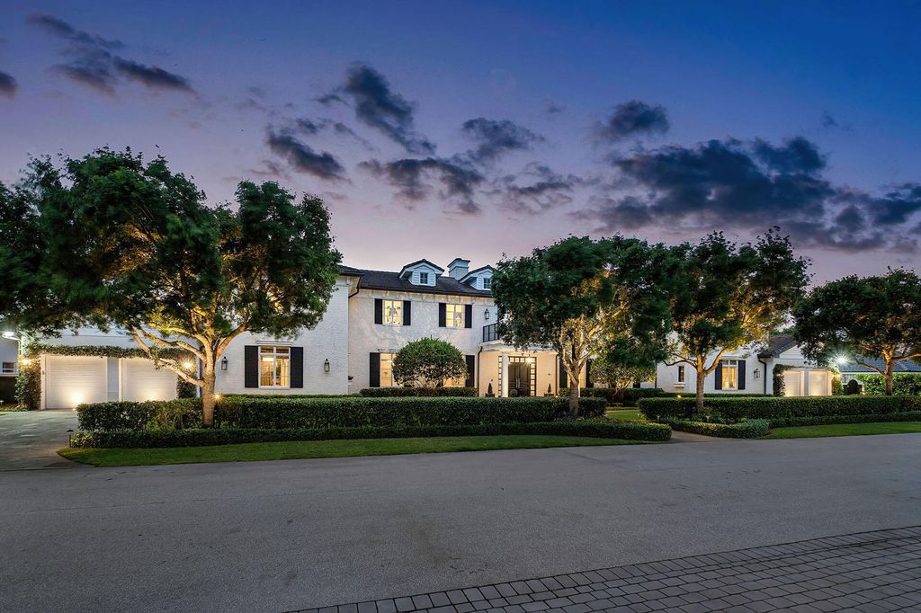 Live the epitome of luxury living in this 5-bedroom masterpiece by Tuthill Architecture in Boca Raton. Featuring a designer interior, pool, basketball court, putting green, casita, this estate offers the perfect blend of elegance and functionality.