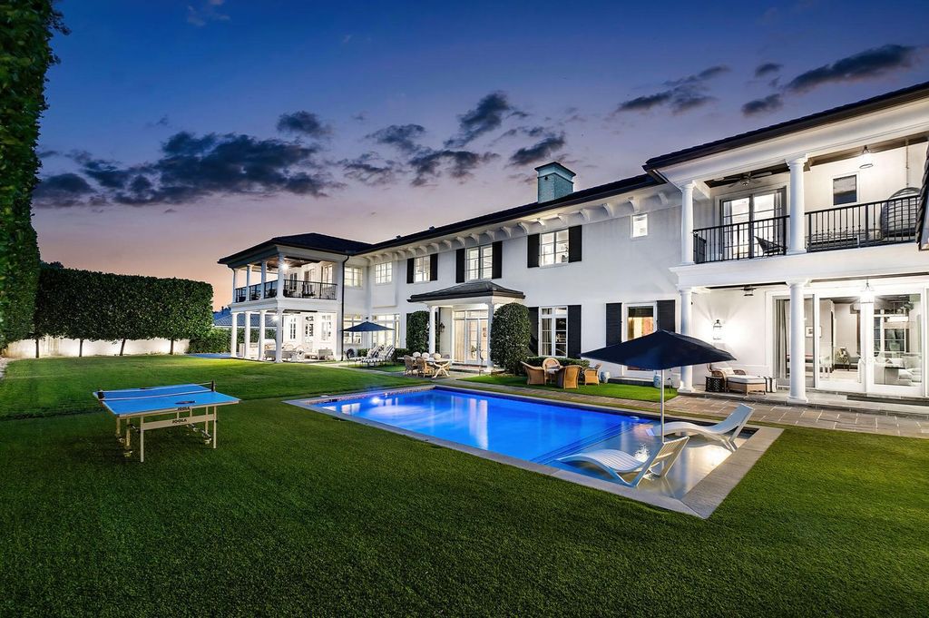 Live the epitome of luxury living in this 5-bedroom masterpiece by Tuthill Architecture in Boca Raton. Featuring a designer interior, pool, basketball court, putting green, casita, this estate offers the perfect blend of elegance and functionality.