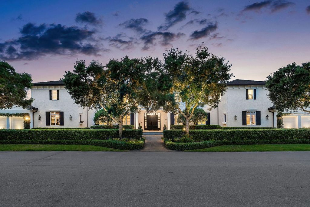 Live the epitome of luxury living in this 5-bedroom masterpiece by Tuthill Architecture in Boca Raton. Featuring a designer interior, pool, basketball court, putting green, casita, this estate offers the perfect blend of elegance and functionality.