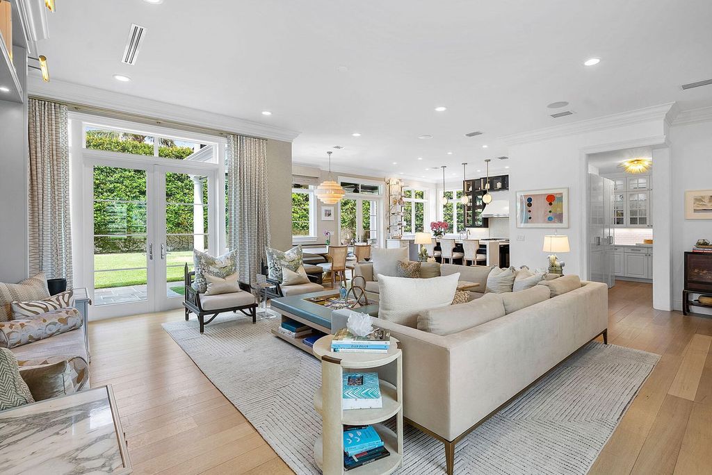 Live the epitome of luxury living in this 5-bedroom masterpiece by Tuthill Architecture in Boca Raton. Featuring a designer interior, pool, basketball court, putting green, casita, this estate offers the perfect blend of elegance and functionality.