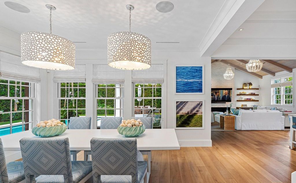 This stunning 4-bedroom estate boasts designer interiors, a sparkling pool and spa, and deeded beach club access.