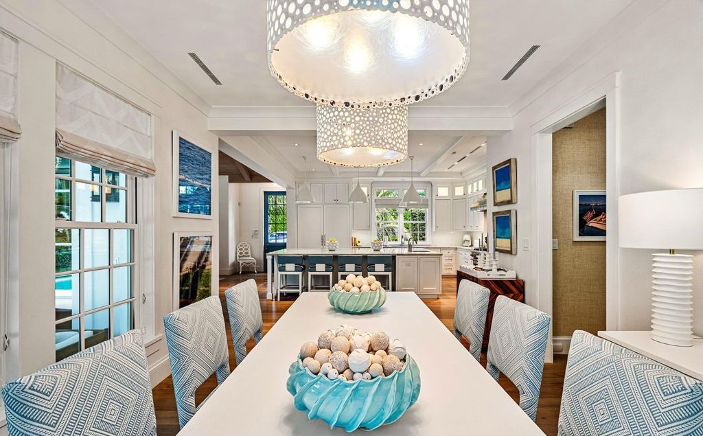 This stunning 4-bedroom estate boasts designer interiors, a sparkling pool and spa, and deeded beach club access.