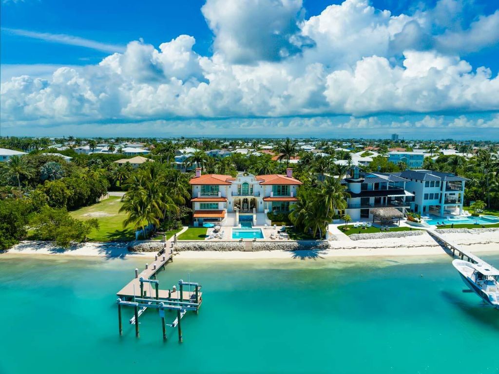 Escape to paradise in this stunning Key Colony Beach estate! Featuring an in-ground pool, private beach, and sprawling dock, this home offers unparalleled Florida Keys living. Enjoy ocean views, a chef's kitchen, and luxurious primary suite. Call today!