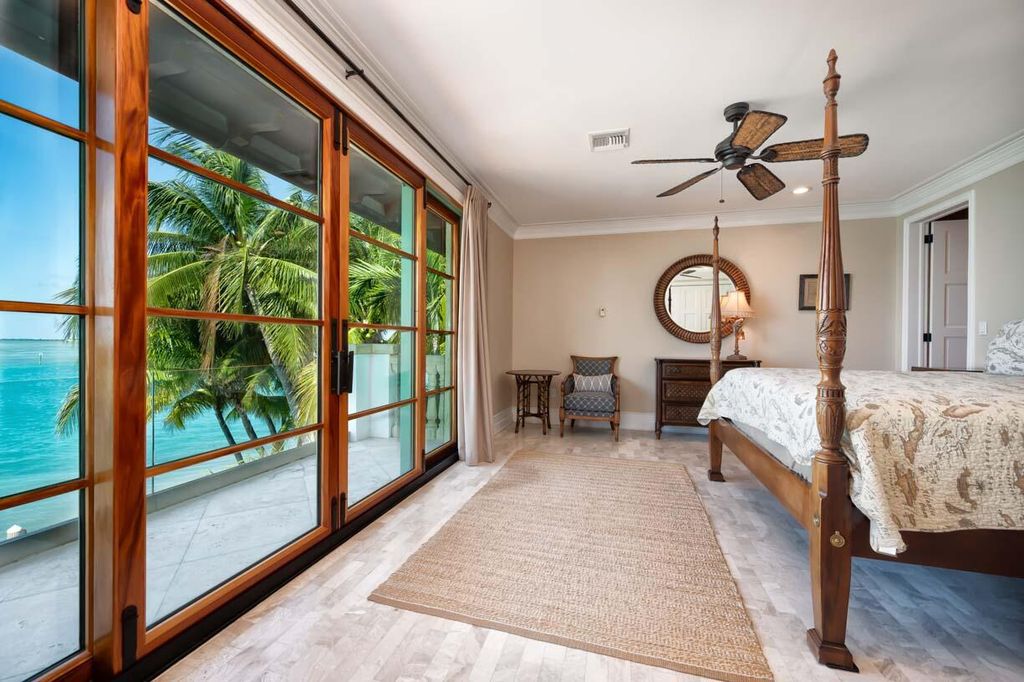 Escape to paradise in this stunning Key Colony Beach estate! Featuring an in-ground pool, private beach, and sprawling dock, this home offers unparalleled Florida Keys living. Enjoy ocean views, a chef's kitchen, and luxurious primary suite. Call today!