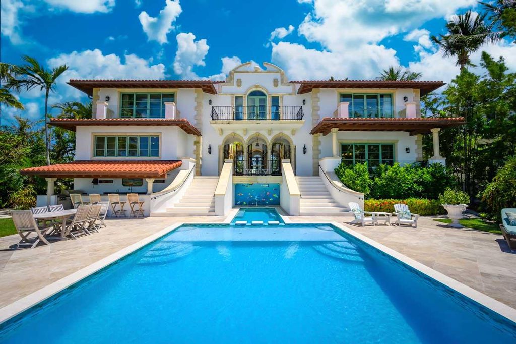 Escape to paradise in this stunning Key Colony Beach estate! Featuring an in-ground pool, private beach, and sprawling dock, this home offers unparalleled Florida Keys living. Enjoy ocean views, a chef's kitchen, and luxurious primary suite. Call today!