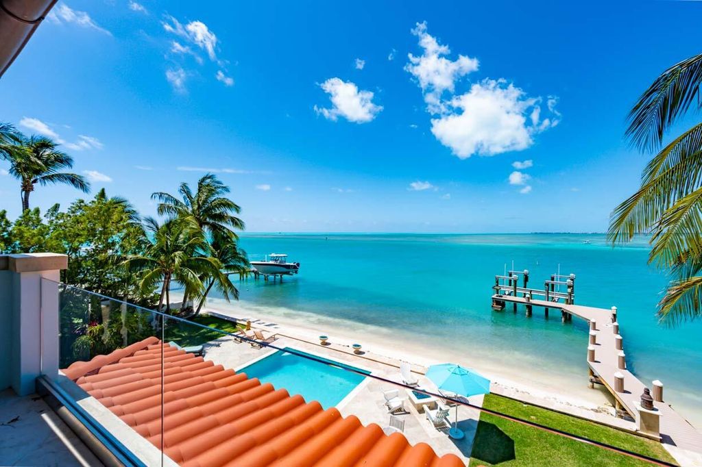 Escape to paradise in this stunning Key Colony Beach estate! Featuring an in-ground pool, private beach, and sprawling dock, this home offers unparalleled Florida Keys living. Enjoy ocean views, a chef's kitchen, and luxurious primary suite. Call today!