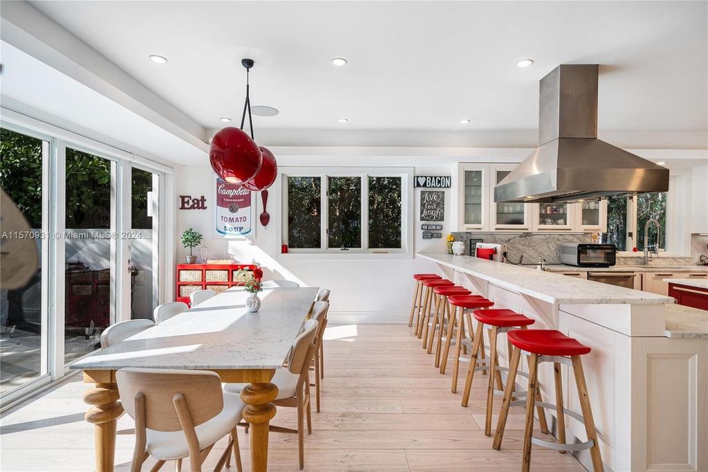 This fully renovated 7-bed, 5.5-bath masterpiece boasts stunning sunset views, a modern floor plan ideal for entertaining, and a sparkling pool with LED lighting.