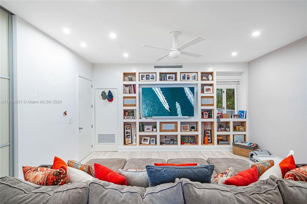 This fully renovated 7-bed, 5.5-bath masterpiece boasts stunning sunset views, a modern floor plan ideal for entertaining, and a sparkling pool with LED lighting.