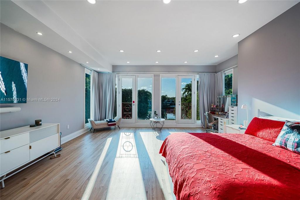 This fully renovated 7-bed, 5.5-bath masterpiece boasts stunning sunset views, a modern floor plan ideal for entertaining, and a sparkling pool with LED lighting.