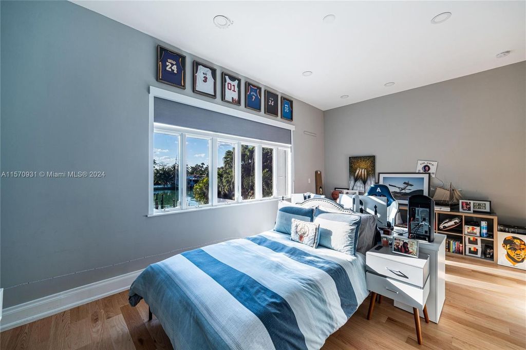 This fully renovated 7-bed, 5.5-bath masterpiece boasts stunning sunset views, a modern floor plan ideal for entertaining, and a sparkling pool with LED lighting.