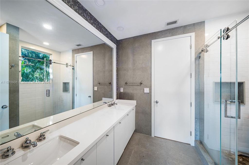 This fully renovated 7-bed, 5.5-bath masterpiece boasts stunning sunset views, a modern floor plan ideal for entertaining, and a sparkling pool with LED lighting.